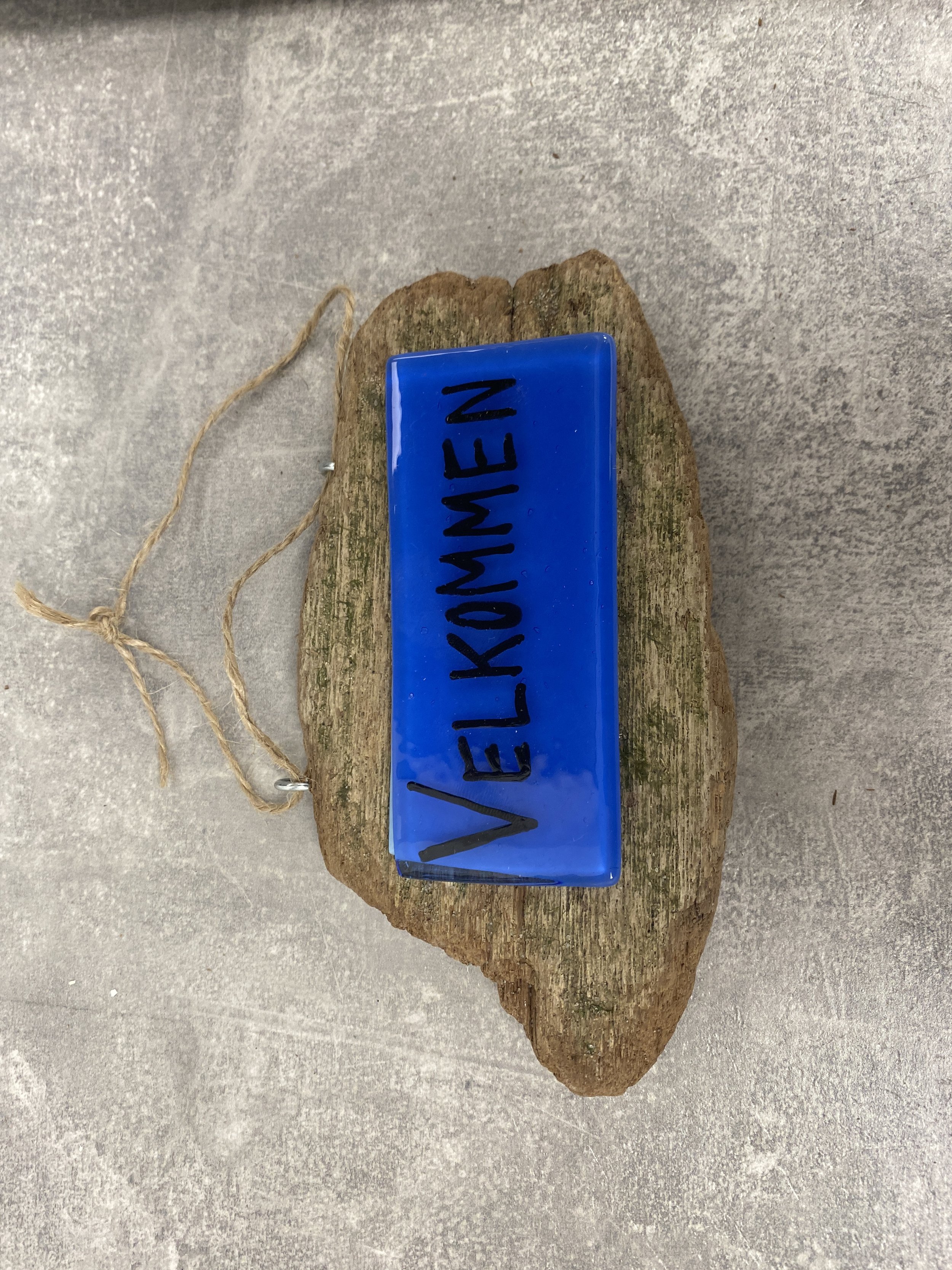 Blåt velkommen skilt