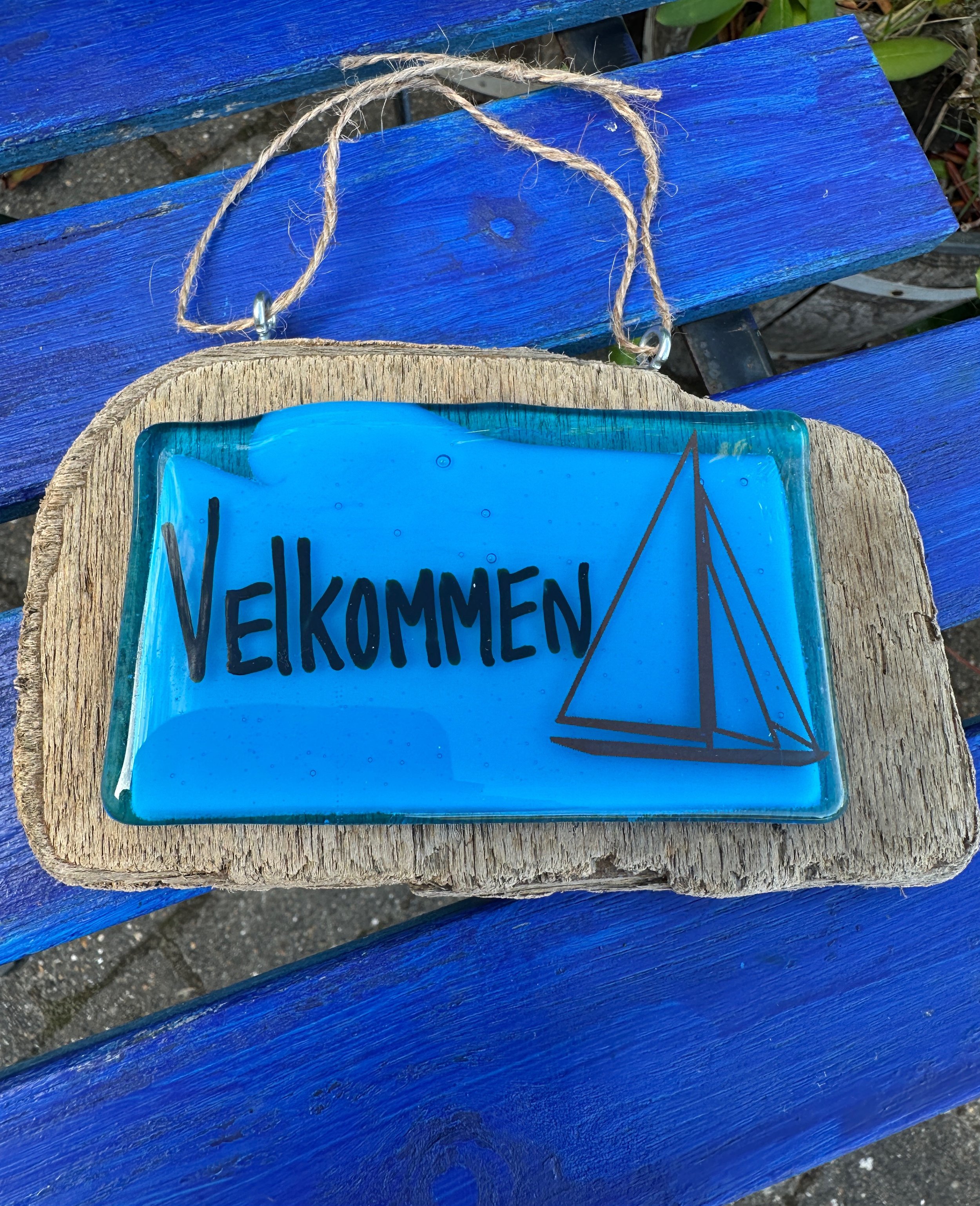 Velkommen skilt med sejlbåd